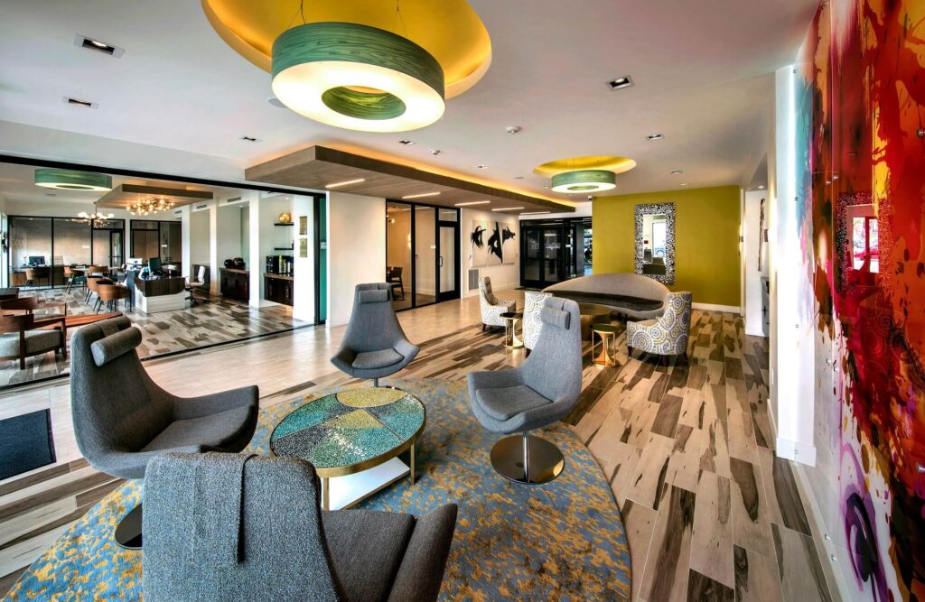 Clubhouse lobby with lounge seating and art