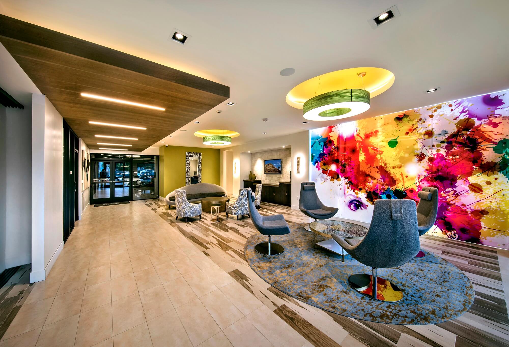 Clubhouse lobby with lounge seating and art