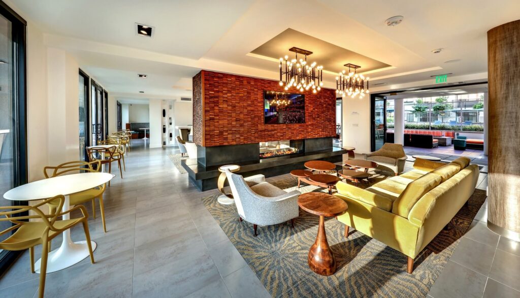 Clubhouse lounge with fire place and sofas